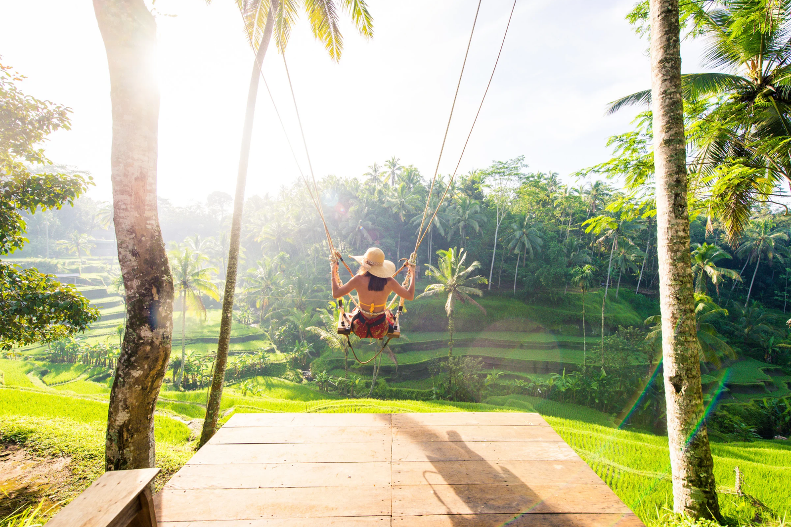 A Frazé Bali concierge welcoming a traveller at sunset
